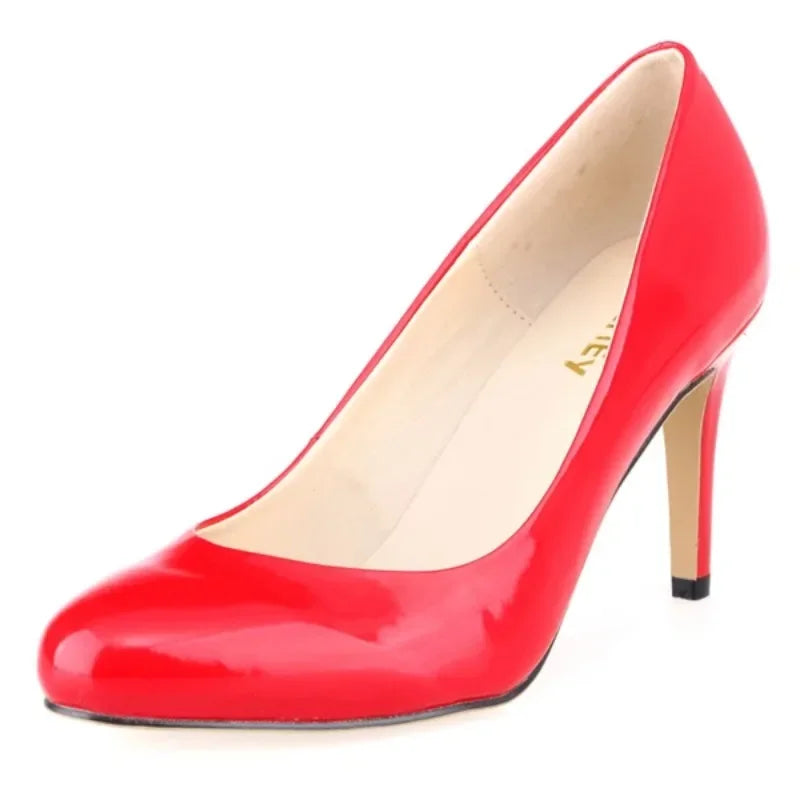 Classic Women’s Pumps: Elegant Mid-Heel Shoes with Round Toes.