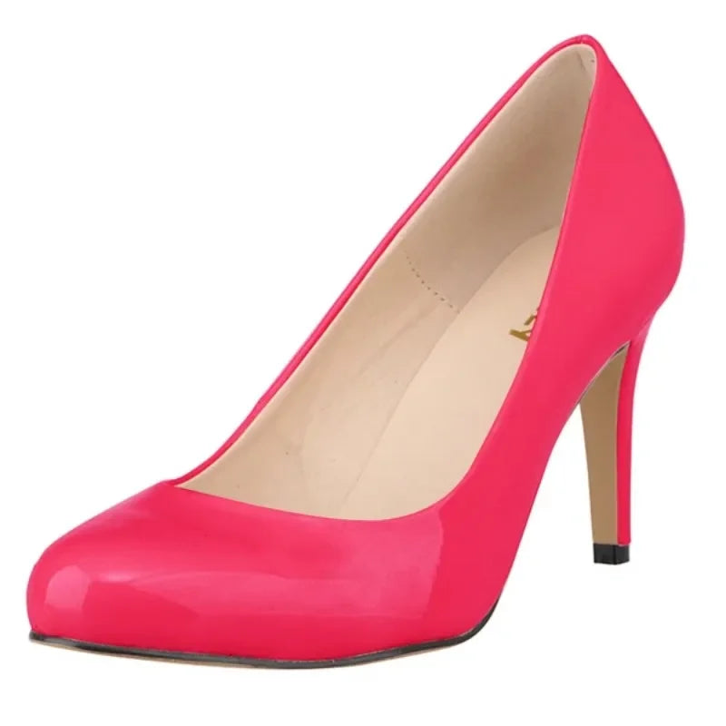 Classic Women’s Pumps: Elegant Mid-Heel Shoes with Round Toes.